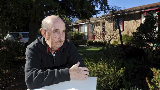 A neglected and unfinished home in Yambina Crescent, Warramanga has cost the ACT Government more than $100,000 in court costs. Neighbour Wayne Mitchell isn't impressed with the saga.