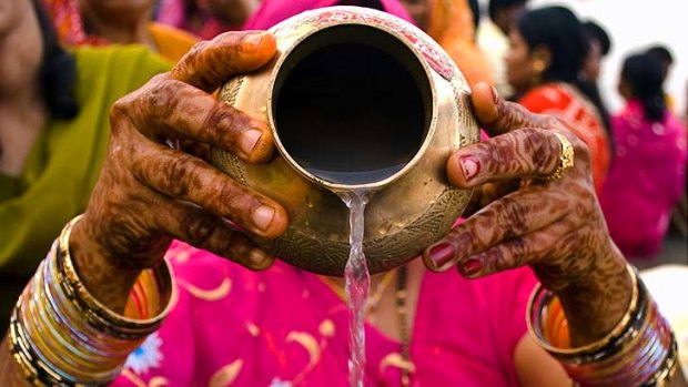 Daily rhythms ... celebrations during the Chhath Puja, a Hindu ritual.