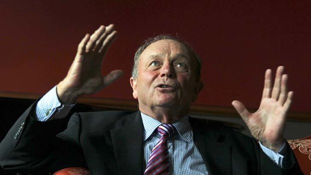 Raking them in . . . Gerry Harvey buys more than half a million shares in Harvey Norman.