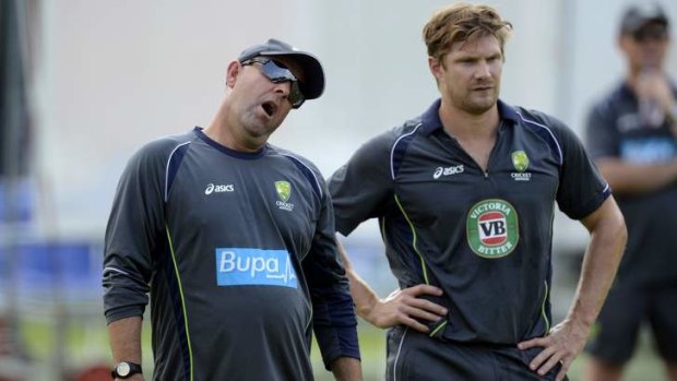 Yawning gap: Darren Lehmann (left) and Shane Watson.  Cricket Australia boss James Sutherland says team morale has improved since Lehmann's appointment as head coach.