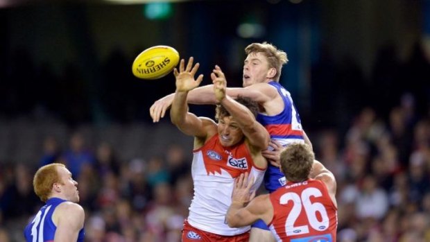 Jordan Roughead (centre) will add some muscle and height to the Bulldogs defence.