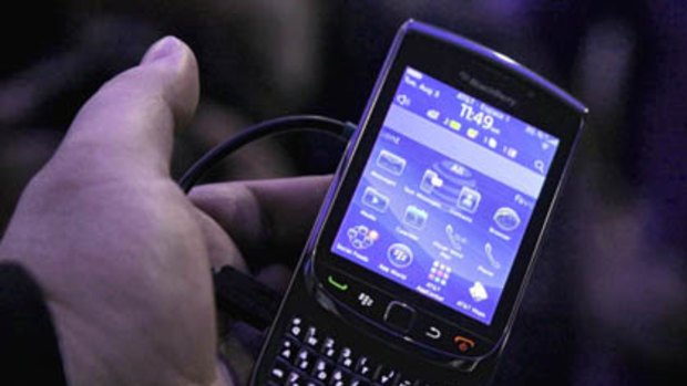 The new BlackBerry Torch is displayed during a product introduction.
