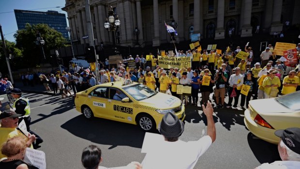 A protest against the buyback scheme outside State Parliament in February.