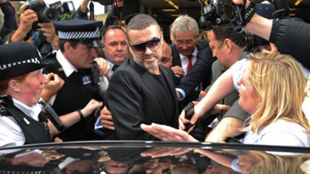 George Michael leaves the Highbury Corner Magistrates Court in London.