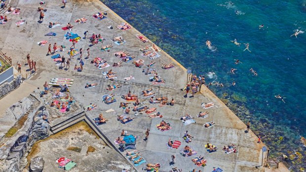 Sun worshippers on the "concrete beach" at Clovelly in Sydney's eastern suburbs.