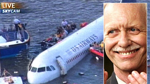 Passengers, crew and rescuers surround a US Airways jetliner after it ditched into the Hudson River. Inset: Pilot Chesley 'Sully' Sullenberger. Photo: Reuters/AP