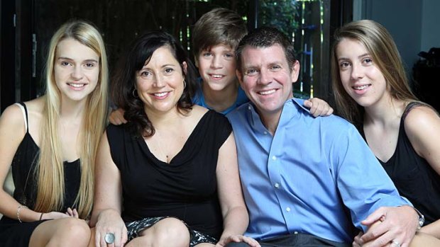 Family man: Mike Baird and wife Kerryn with their three children (from left) Cate, Luke and Laura.