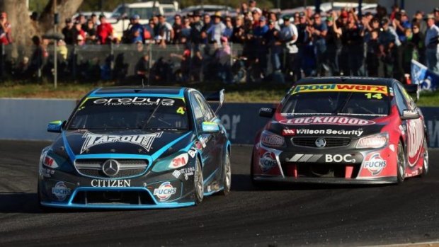 Foiled: Lee Holdsworth takes the lead from Fabian Coulthard near the end of the second race of the Winton 400.