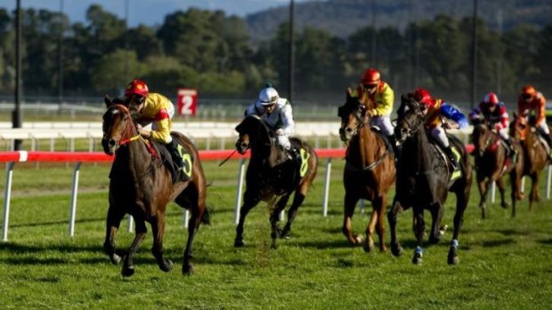 Jockey Sam Clipperton steers Just A Blur to victory at Canberra on Thursday.