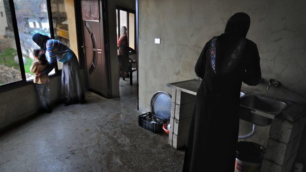 Syrian refugees in a flat in the southern Lebanon town of Shebaa.