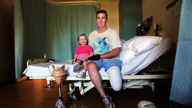 Sean Crone, 22, and his 22-month-old daughter Ella-Rose. Sean is ready to leave hospital with his new prosthetic limb after losing his leg in a car accident.