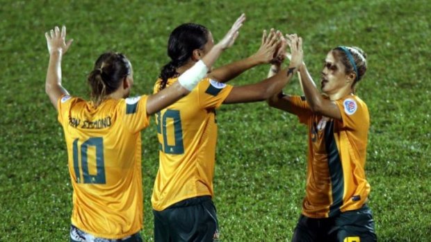 Katrina Gorry (right) celebrates after scoring for the Matildas in their 2-0 win over Vietnam on Sunday.