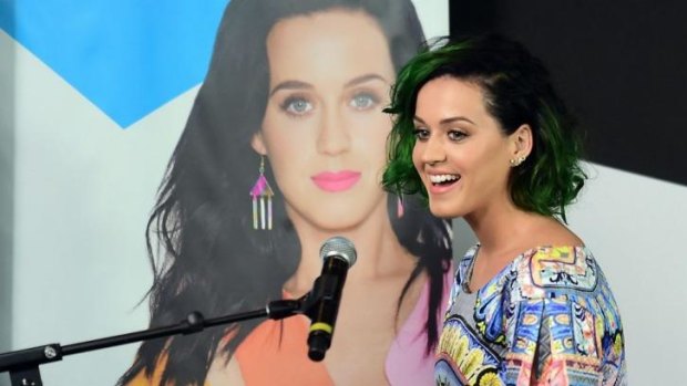 Pop star Katy Perry makes an offer of a theme song to Hillary Clinton.