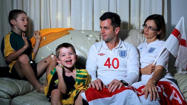 Divided loyalties: Ashton, 6, and Tanner, 3, will fly the flag for Australia at the World Cup, but parents Simon and Sharon Cox support their homeland, England.
