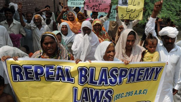 Villagers protest against the country's strict blasphemy laws.