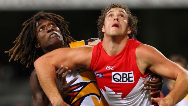 "He's an imposing figure against the other ruckmen" ... Jude Bolton on the Swans' Shane Mumford, pictured right.