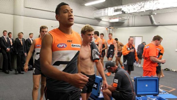 Israel Folau and fellow Giants after getting their first game under their belts on Saturday.