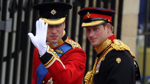 Wave for wellwishers ... Prince William and Prince Harry arrive at the West Door of Westminster Abbey.