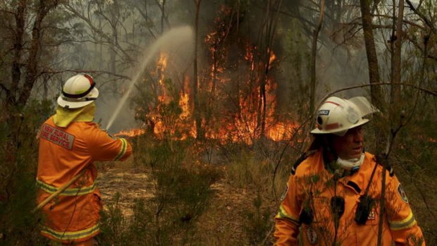 Firefighting strike teams converge on Bells Line of Road fires near Mount Victoria west of Sydney on Sunday.