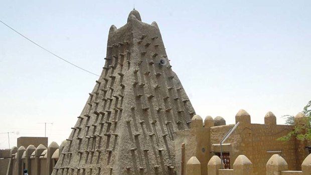 Islamist militants destroyed ancient tombs of Muslim saints in Mali's fabled city, sparking international condemnation.