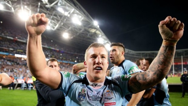 Did that really happen? Blues halfback Trent Hodkinson celebrates in 2014.