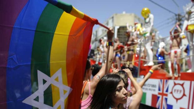 Out and proud: Thousands take part in Tel Aviv's annual parade for gays and lesbians. The hedonistic and secular Israeli city has ambitions to be the most gay-friendly place on earth.