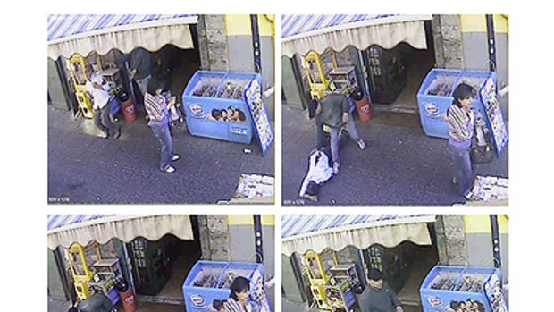 Images from CCTV footage released by Italian police shows Mariano Bacioterracino, 53, shot dead outside a bar by an unidentified gunman in Naples.