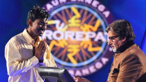 Sushil Kumar (left) is told of his win by actor Amitabh Bachchan on the Indian version of Who Wants to Be a Millionaire.