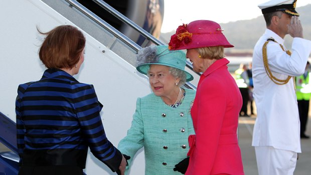 Prime Minister Julia Gillard has defended her decision not to curtsy before the Queen.