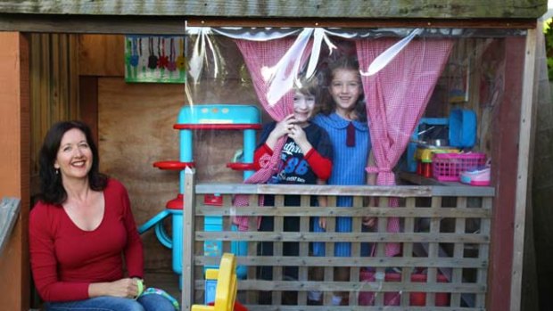 Helping them out … Megan Cliff at home in the northern beaches with Kale, 4, and Alicia, 6.