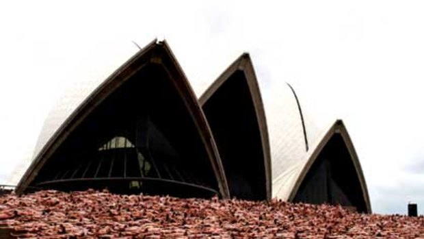 Thousands stripped for photographer Spencer Tunick at Sydney Opera House this morning.