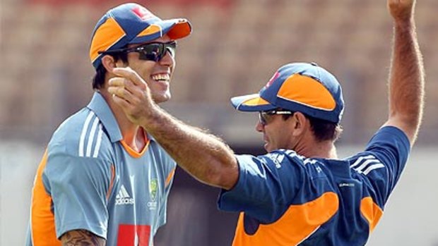 Paceman Mitchell Johnson and skipper Ricky Ponting clown around at practice in Adelaide.