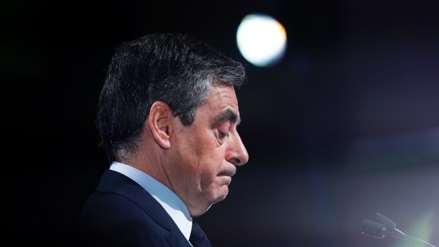 Conservative presidential candidate Francois Fillon delivers his speech during a campaign meeting in Aubervilliers, outside Paris, France, on Saturday. 