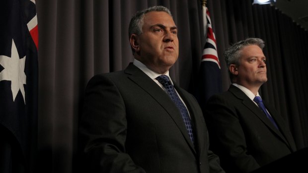 Selling the bad news well is half the rent: Treasurer Joe Hockey and Finance Minister Senator Mathias Cormann as they revealed the budget update.