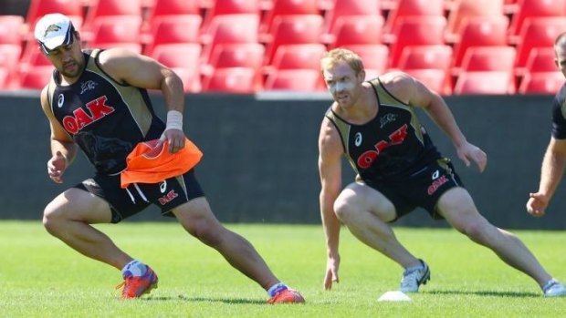 Panthers halves Jamie Soward and Peter Wallace go through their paces at training.