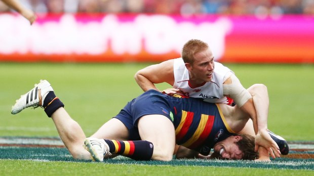 Melbourne's Bernie Vince and Crow Patrick Dangerfield turn to wrestling.