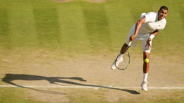 Nick Kyrgios serves to Rafael Nadal during his spectacular upset win.