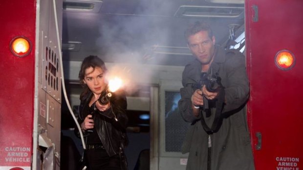 Emilia Clarke is Sarah Connor and Jai Courtney is Kyle Reese in <i>Terminator Genisys</i>.