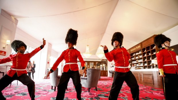 Royal guards get their groove on in the Emirates marquee.