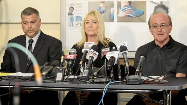 Detectove Inspector Karl Thorton (left) with Richelle and Sam Arber, parents of missing tennis coach, Paul Arber, at a press conference in Hamilton on Wednesday.