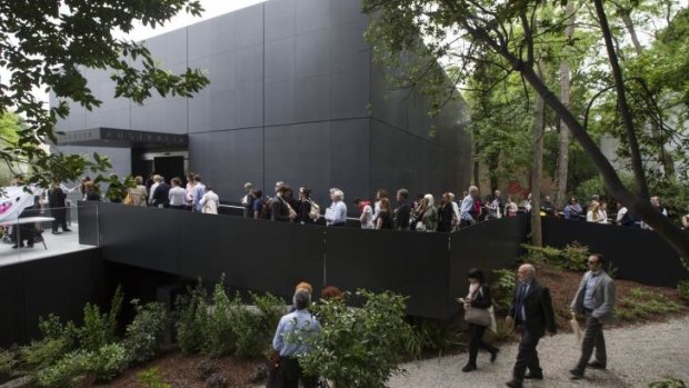 Art lovers queue to see inside the new Australian Pavilion in the Giardiani at the Venice Biennale.