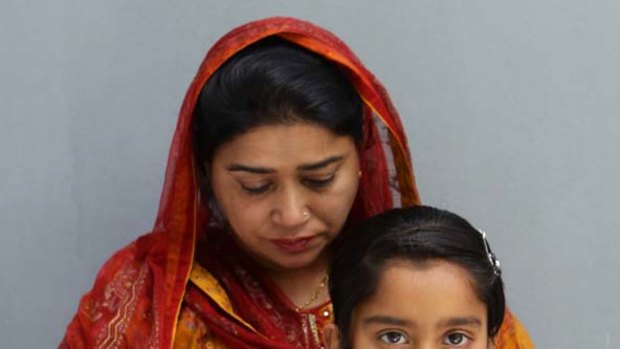 Popy Jabber with her daughter, Jhahanara, who may be sent back to Bangladesh despite needing more surgery.