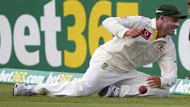Mike Hussey pulls one back from the ropes.
