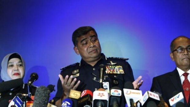 Malaysia's police chief, Inspector General Khalid Abu Bakar, speaks at a news conference at the Kuala Lumpur International Airport.