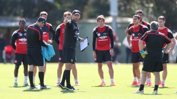 Leader: Western Sydney Wanderers coach Tony Popovic (centre).
