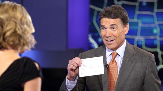 Trying to save his campaign ... Rick Perry appears on  the Fox News Channel.