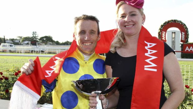Lip service: Damien Oliver with Natalie McCall after the race.