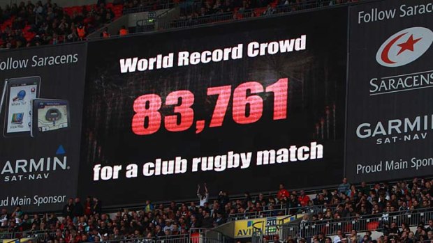 The scoreboard announces the record crowd during the Aviva Premiership match between Saracens and Harlequins at Wembley Stadium.