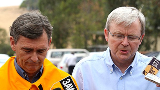 Victorian Premier John Brumby (left) with Prime Minister Kevin Rudd (right) at Kangaroo Ground on Sunday.