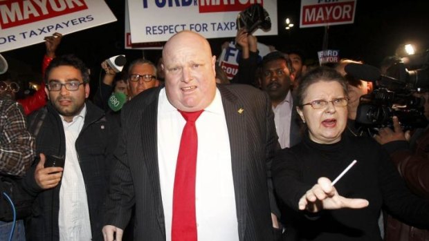 Rob Ford leaves the hall after speaking to supporters after being elected as a councillor in the municipal election in Toronto.